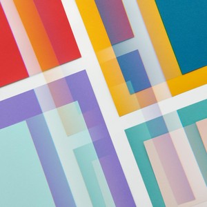 Vibrant geometric abstract design featuring colorful overlays and patterns.